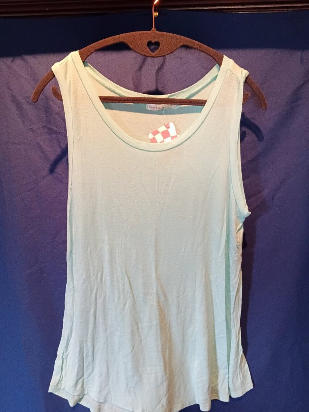 New light blue in color Coco and Main Tee